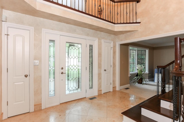 560 81st St, Burr Ridge, IL 60527 - foyer entrance featuring stairway, a high ceiling, and tile patterned floors