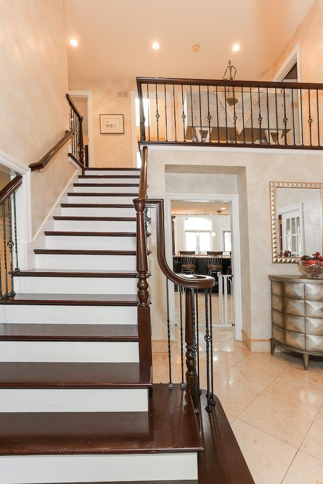 560 81st St, Burr Ridge, IL 60527 - stairs featuring tile patterned flooring and recessed lighting