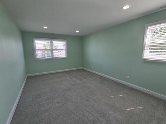 1807 W Locust Ln, Mount Prospect, IL 60056 - carpeted empty room with healthy amount of natural light and recessed lighting
