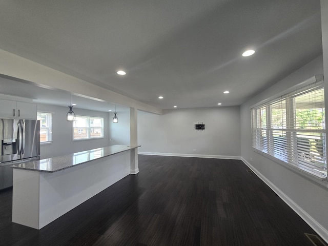 1807 W Locust Ln, Mount Prospect, IL 60056 - unfurnished living room featuring dark wood-style floors and recessed lighting