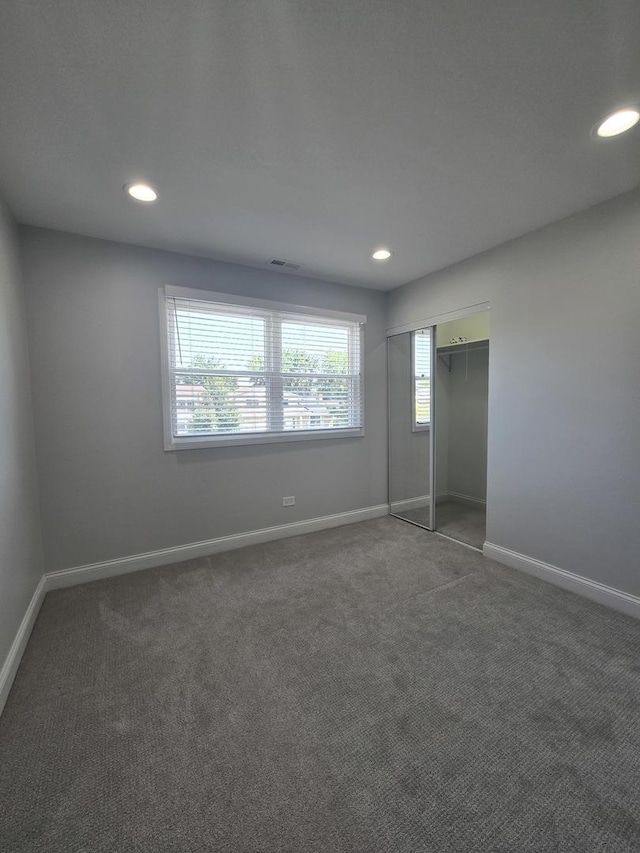 1807 W Locust Ln, Mount Prospect, IL 60056 - unfurnished bedroom with carpet floors, recessed lighting, and a closet