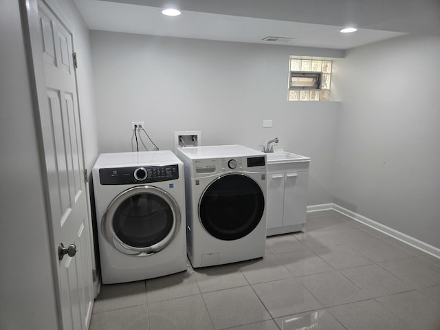 1807 W Locust Ln, Mount Prospect, IL 60056 - washroom featuring washer and dryer, cabinet space, light tile patterned floors, and recessed lighting