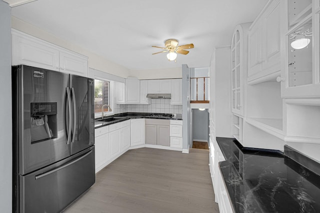 26W278 Harrison Ave, Winfield, IL 60190 - kitchen featuring stainless steel fridge, white cabinetry, ceiling fan, light wood-type flooring, and decorative backsplash