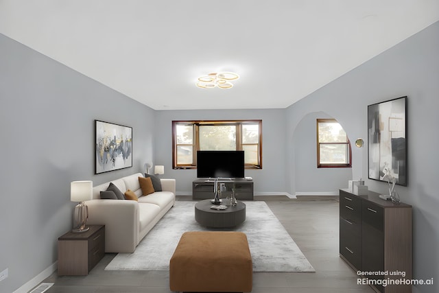 26W278 Harrison Ave, Winfield, IL 60190 - living area featuring arched walkways and wood finished floors