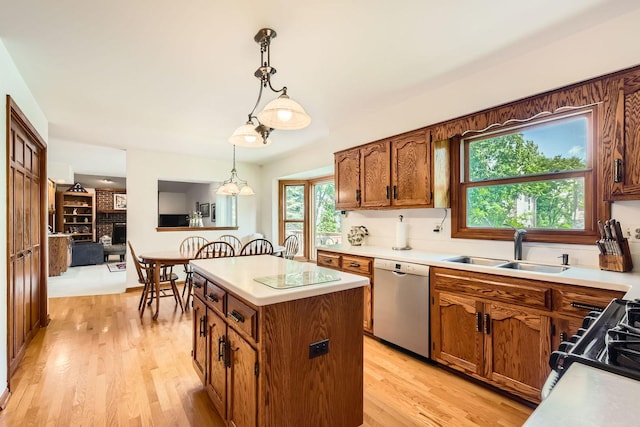 3825 Charlemagne Dr, Hoffman Estates, IL 60192 - kitchen with dishwasher, a center island, brown cabinets, pendant lighting, and light wood finished floors