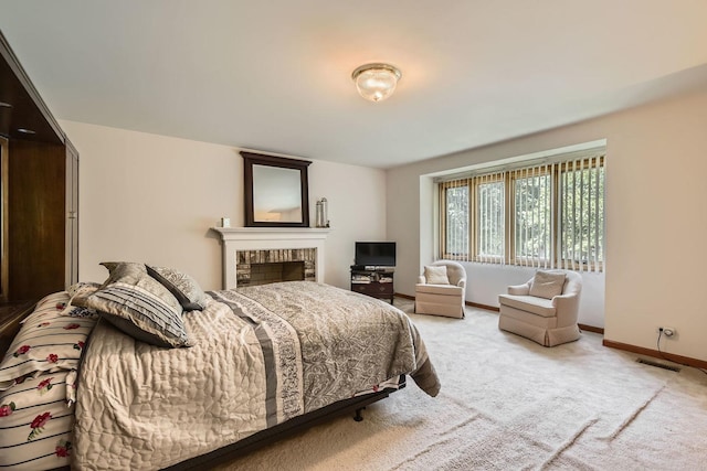 3825 Charlemagne Dr, Hoffman Estates, IL 60192 - bedroom featuring a brick fireplace and carpet