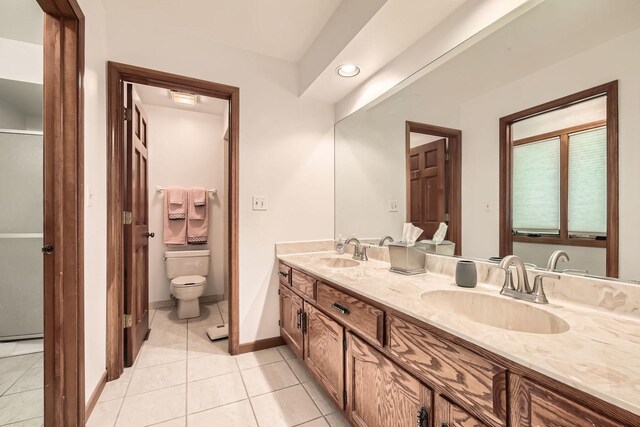 3825 Charlemagne Dr, Hoffman Estates, IL 60192 - bathroom with double vanity, tile patterned floors, and recessed lighting