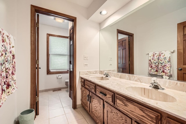 3825 Charlemagne Dr, Hoffman Estates, IL 60192 - bathroom featuring double vanity and tile patterned floors
