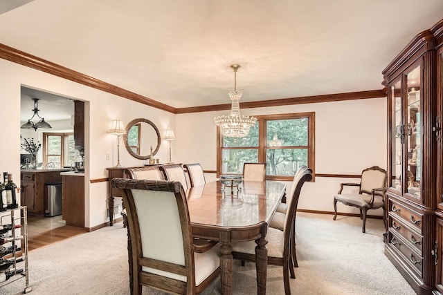 3825 Charlemagne Dr, Hoffman Estates, IL 60192 - dining room featuring light carpet, a chandelier, and crown molding