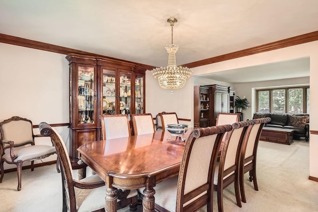 3825 Charlemagne Dr, Hoffman Estates, IL 60192 - dining area featuring a chandelier, light colored carpet, and crown molding