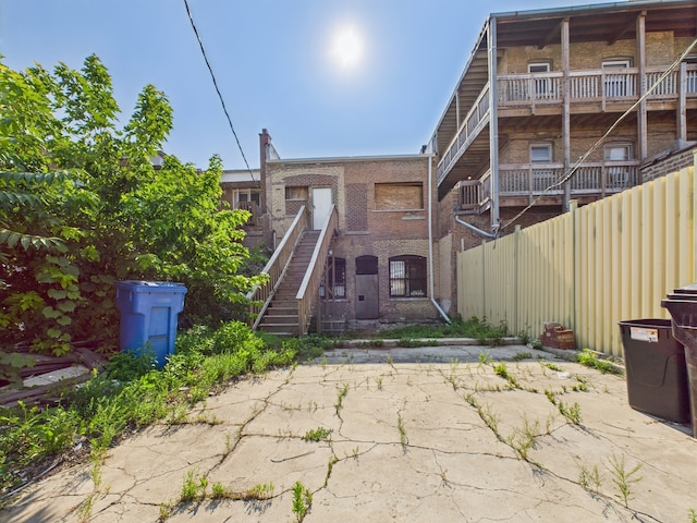 8551 S Ashland Ave, Chicago, IL 60620 - back of house with stairway and brick siding