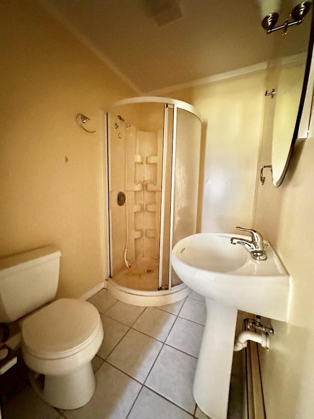 673 Parkway Ave, Elgin, IL 60120 - full bath with a stall shower and tile patterned flooring