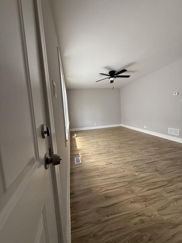 1400 W 73rd Pl, Chicago, IL 60636 - empty room with wood finished floors and ceiling fan