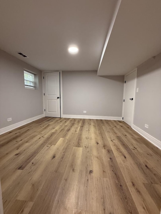 1400 W 73rd Pl, Chicago, IL 60636 - basement featuring baseboards and wood finished floors