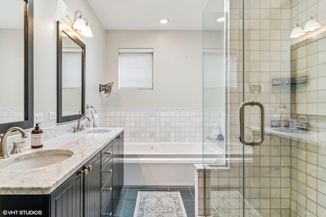 3019 W Cornelia Ave, Chicago, IL 60618 - bathroom featuring a bath, double vanity, a shower stall, tile patterned flooring, and recessed lighting