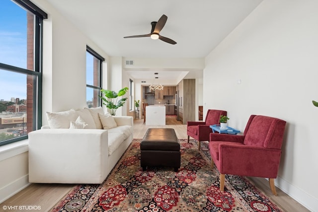 1261 N Paulina Ave Unit 6, Chicago, IL 60622 - living area with light wood finished floors and a ceiling fan