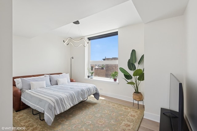 1261 N Paulina Ave Unit 6, Chicago, IL 60622 - bedroom featuring wood finished floors and baseboards