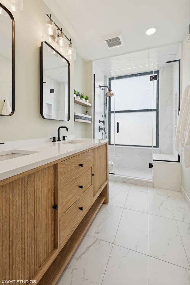 1261 N Paulina Ave Unit 6, Chicago, IL 60622 - bathroom featuring marble finish flooring, double vanity, a marble finish shower, and recessed lighting