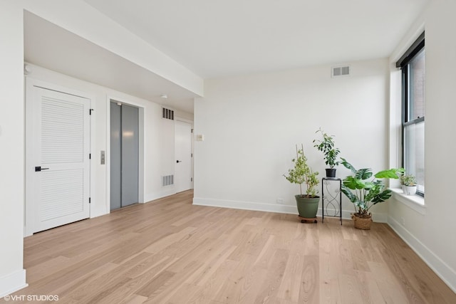 1261 N Paulina Ave Unit 6, Chicago, IL 60622 - spare room featuring light wood finished floors and elevator