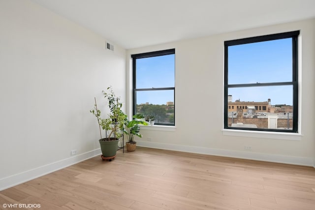 1261 N Paulina Ave Unit 6, Chicago, IL 60622 - empty room with light wood-type flooring