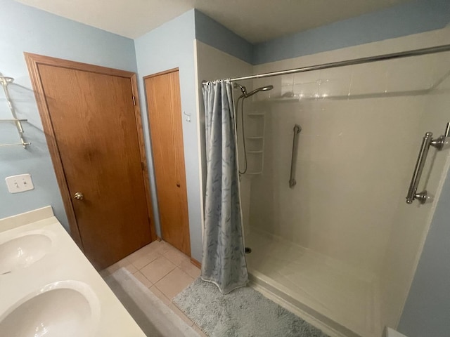 1827 Arbor Falls Dr, Plainfield, IL 60586 - bathroom with a shower with shower curtain, double vanity, and tile patterned floors