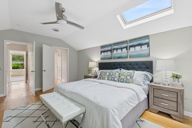 1006 Foster St, Evanston, IL 60201 - bedroom featuring vaulted ceiling, light wood finished floors, ceiling fan, and a skylight
