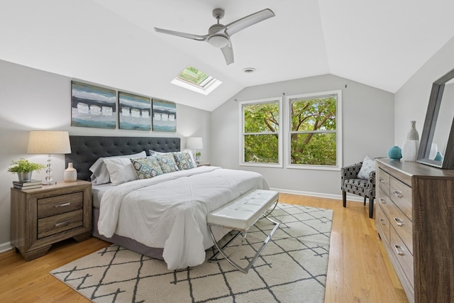 1006 Foster St, Evanston, IL 60201 - bedroom featuring a skylight, light wood finished floors, lofted ceiling, and a ceiling fan