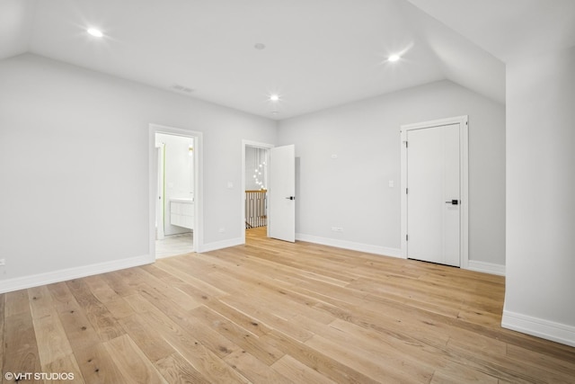 124 Lincoln St, Glenview, IL 60025 - unfurnished bedroom featuring vaulted ceiling, light wood-style floors, recessed lighting, and connected bathroom