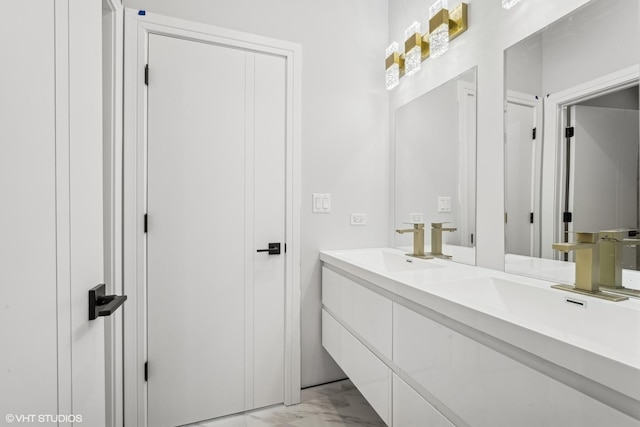 124 Lincoln St, Glenview, IL 60025 - bathroom featuring marble finish flooring and double vanity