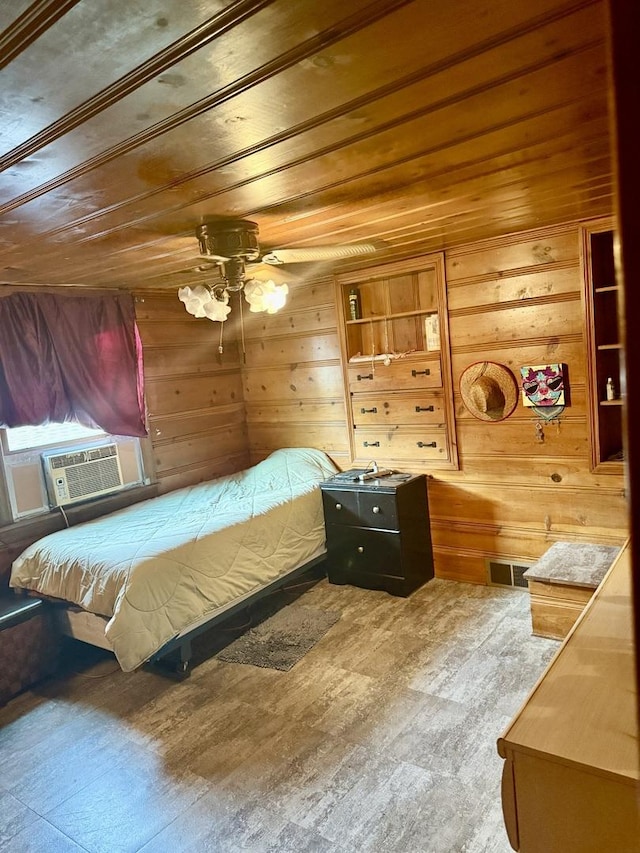 261 S Edison Ave, Elgin, IL 60123 - bedroom featuring cooling unit, wood ceiling, wood walls, wood finished floors, and a ceiling fan