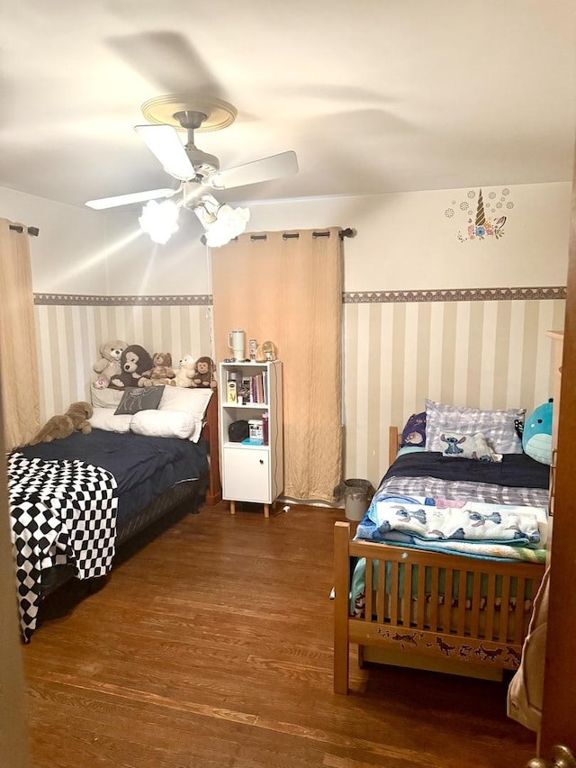 261 S Edison Ave, Elgin, IL 60123 - bedroom with wallpapered walls, wood finished floors, and a ceiling fan