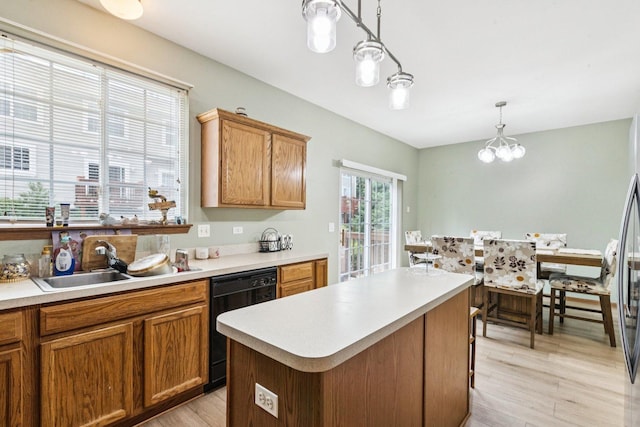 515 Declaration Ln Unit 1401, Aurora, IL 60502 - kitchen with dishwasher, decorative light fixtures, light countertops, and light wood-style floors