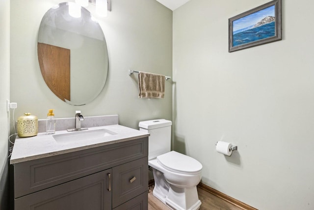 515 Declaration Ln Unit 1401, Aurora, IL 60502 - half bathroom featuring vanity and wood finished floors