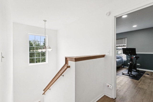 515 Declaration Ln Unit 1401, Aurora, IL 60502 - hall with an upstairs landing, wood finished floors, recessed lighting, and a chandelier
