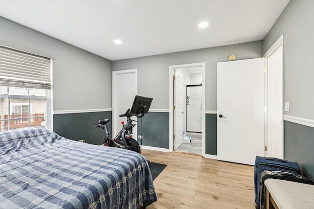 515 Declaration Ln Unit 1401, Aurora, IL 60502 - bedroom featuring light wood-style floors, recessed lighting, and ensuite bath