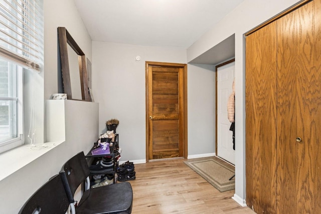 515 Declaration Ln Unit 1401, Aurora, IL 60502 - interior space featuring light wood-type flooring and a desk