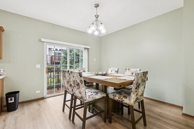 515 Declaration Ln Unit 1401, Aurora, IL 60502 - dining space with light wood-type flooring and a chandelier