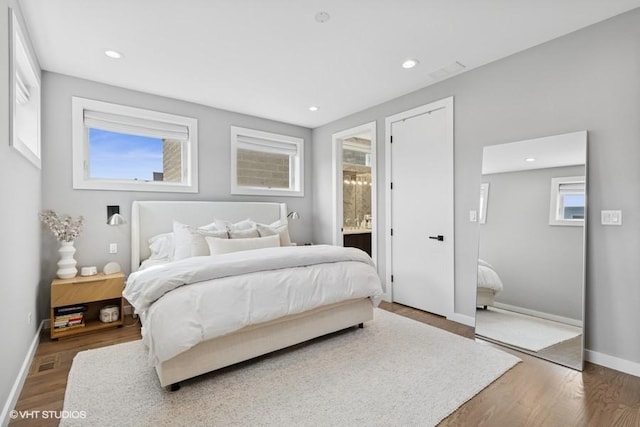 2237 N Hoyne Ave Unit 3S, Chicago, IL 60647 - bedroom with wood finished floors, recessed lighting, and ensuite bathroom