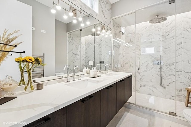 2237 N Hoyne Ave Unit 3S, Chicago, IL 60647 - full bathroom featuring double vanity and a marble finish shower