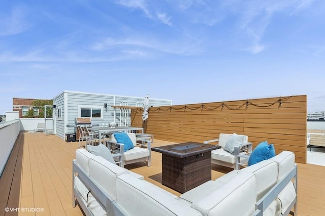 2237 N Hoyne Ave Unit 3S, Chicago, IL 60647 - wooden terrace with an outdoor hangout area and outdoor dining area