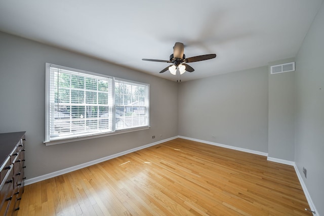 74 White Oak Cir, Saint Charles, IL 60174 - spare room with a ceiling fan and light wood-type flooring