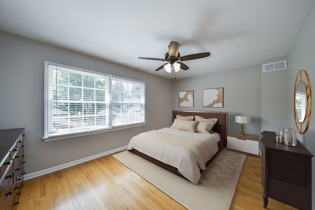 74 White Oak Cir, Saint Charles, IL 60174 - bedroom with light wood-style floors and ceiling fan