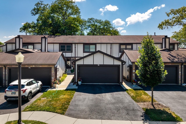 74 White Oak Cir, Saint Charles, IL 60174 - view of front of home with board and batten siding and a shingled roof