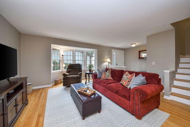 74 White Oak Cir, Saint Charles, IL 60174 - living room with light wood finished floors and stairs