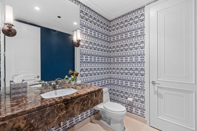 159 E Walton Pl Unit 5C, Chicago, IL 60611 - bathroom with crown molding, wallpapered walls, and vanity