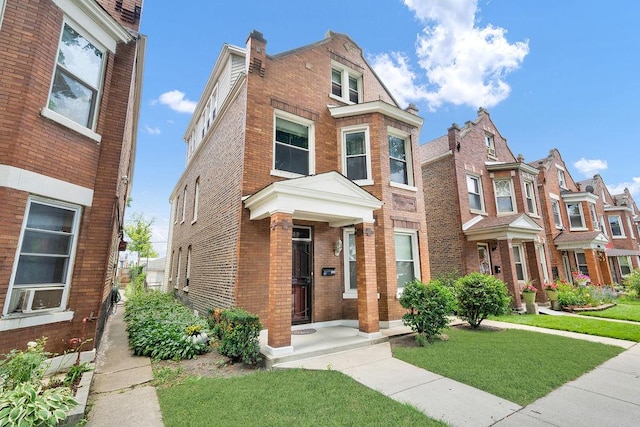 3209 S Harding Ave, Chicago, IL 60623 - view of front of home featuring brick siding, a residential view, and a front lawn