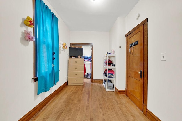 3209 S Harding Ave, Chicago, IL 60623 - corridor with light wood-type flooring and baseboards