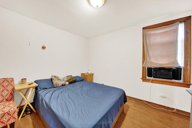 3209 S Harding Ave, Chicago, IL 60623 - bedroom with wood finished floors and cooling unit