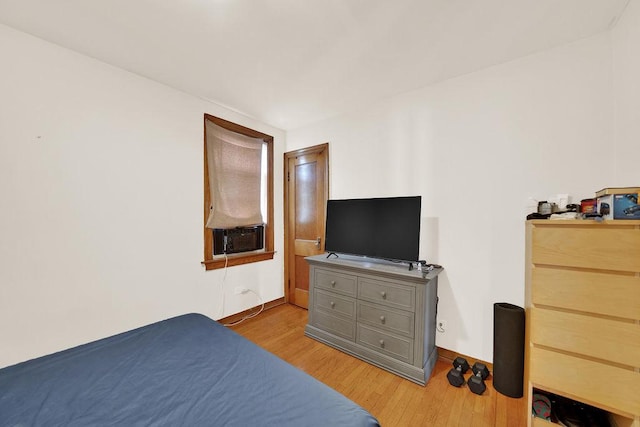 3209 S Harding Ave, Chicago, IL 60623 - bedroom with light wood-style floors and cooling unit