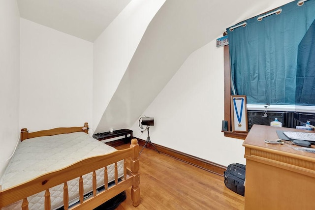 3209 S Harding Ave, Chicago, IL 60623 - bedroom with wood finished floors, an office area, and cooling unit
